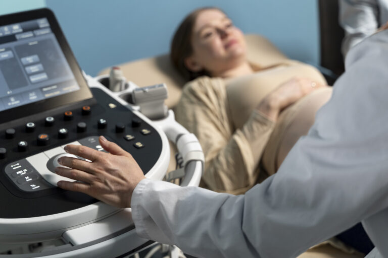 gynecologist-performing-ultrasound-consultation